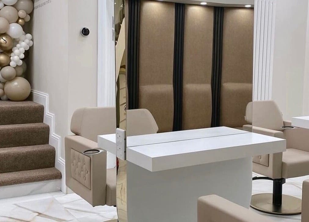 Modern beauty salon interior at Beauty by Chloe in Strabane, Northern Ireland, GB with stylish chairs and decor.