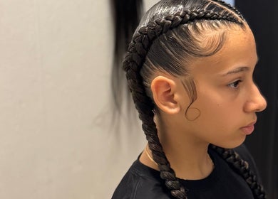 Sophisticated braid hairstyle at Shariiey'sfabulousbraidscw, Willemstad, Curaçao, CW. Perfectly styled hair.