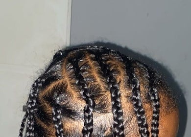 Detailed braiding work at Efu’s Princess Braids, Addis Ababa, Addis Ababa, ET, showcasing expert styling.