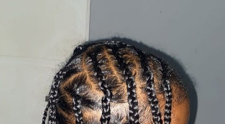 Detailed braiding work at Efu’s Princess Braids, Addis Ababa, Addis Ababa, ET, showcasing expert styling.