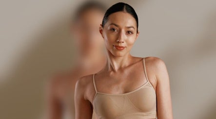 Woman posing gracefully at Luxe Beautè Brows & Body Contouring, North Mackay, Queensland, AU.