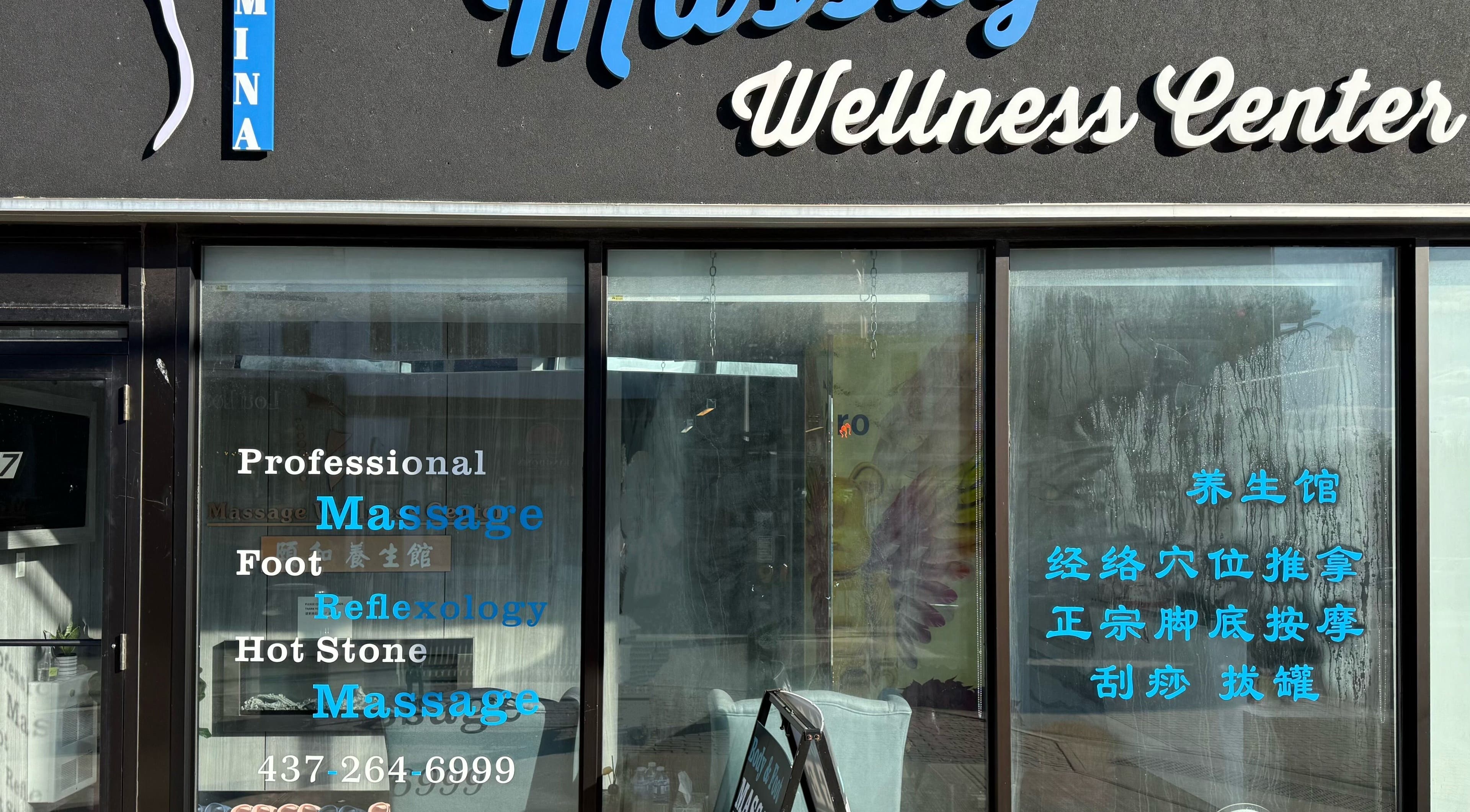 Entrance of Lumina Massage Wellness Center in Markham, Ontario, CA, showcasing services and serene ambiance.