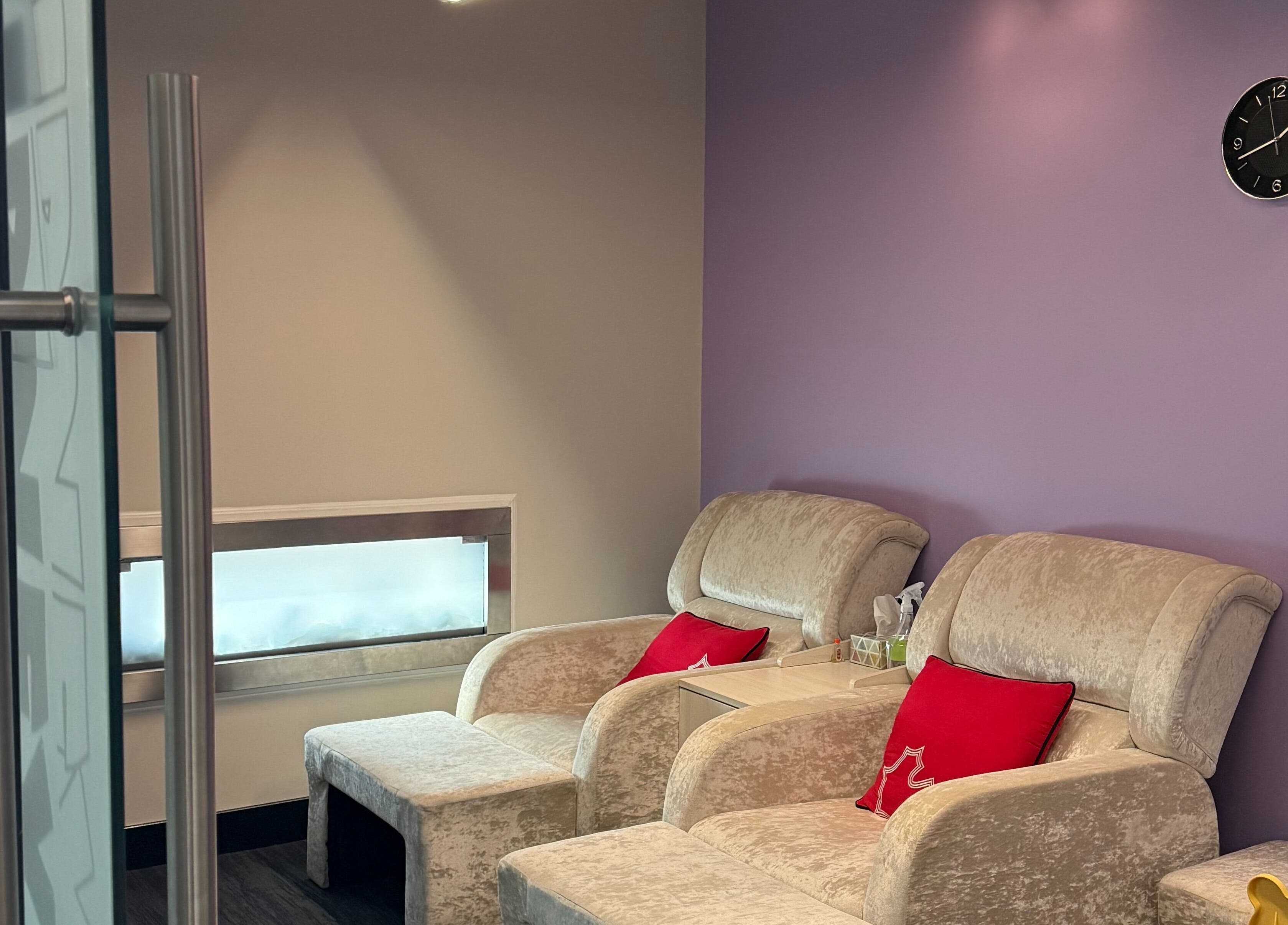 Relax in plush seating at Lumina Massage Wellness Center, Markham, Ontario, CA. Modern and inviting atmosphere.