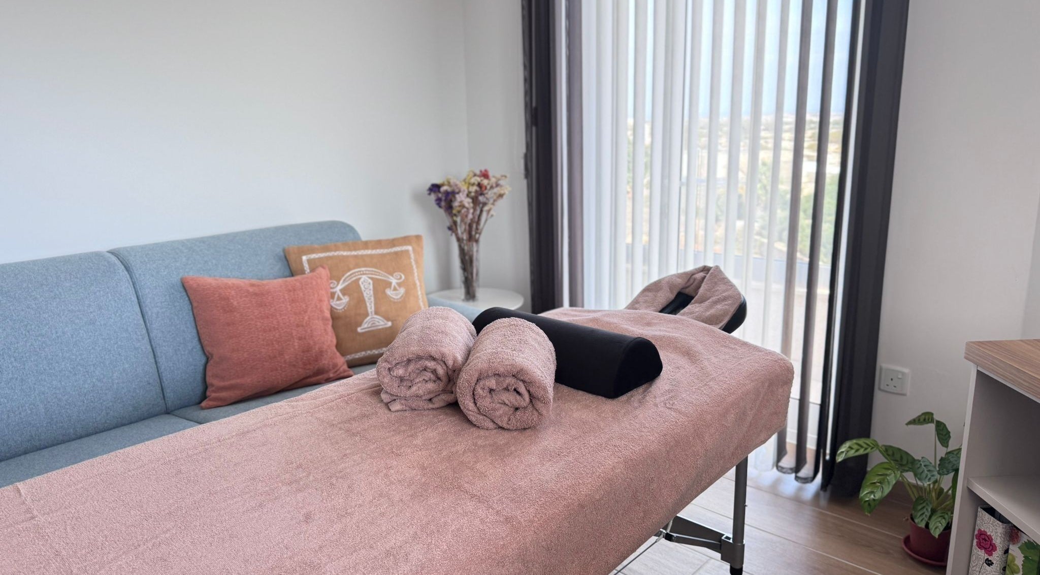 Relaxing massage room with cozy towels at Athletic Pulse, Birkirkara, MT. Ideal for wellness retreats.