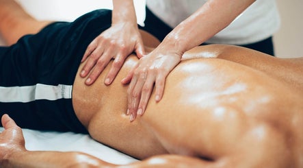 Therapist giving a soothing massage at Mobility and Massage in Huddersfield, England, GB.