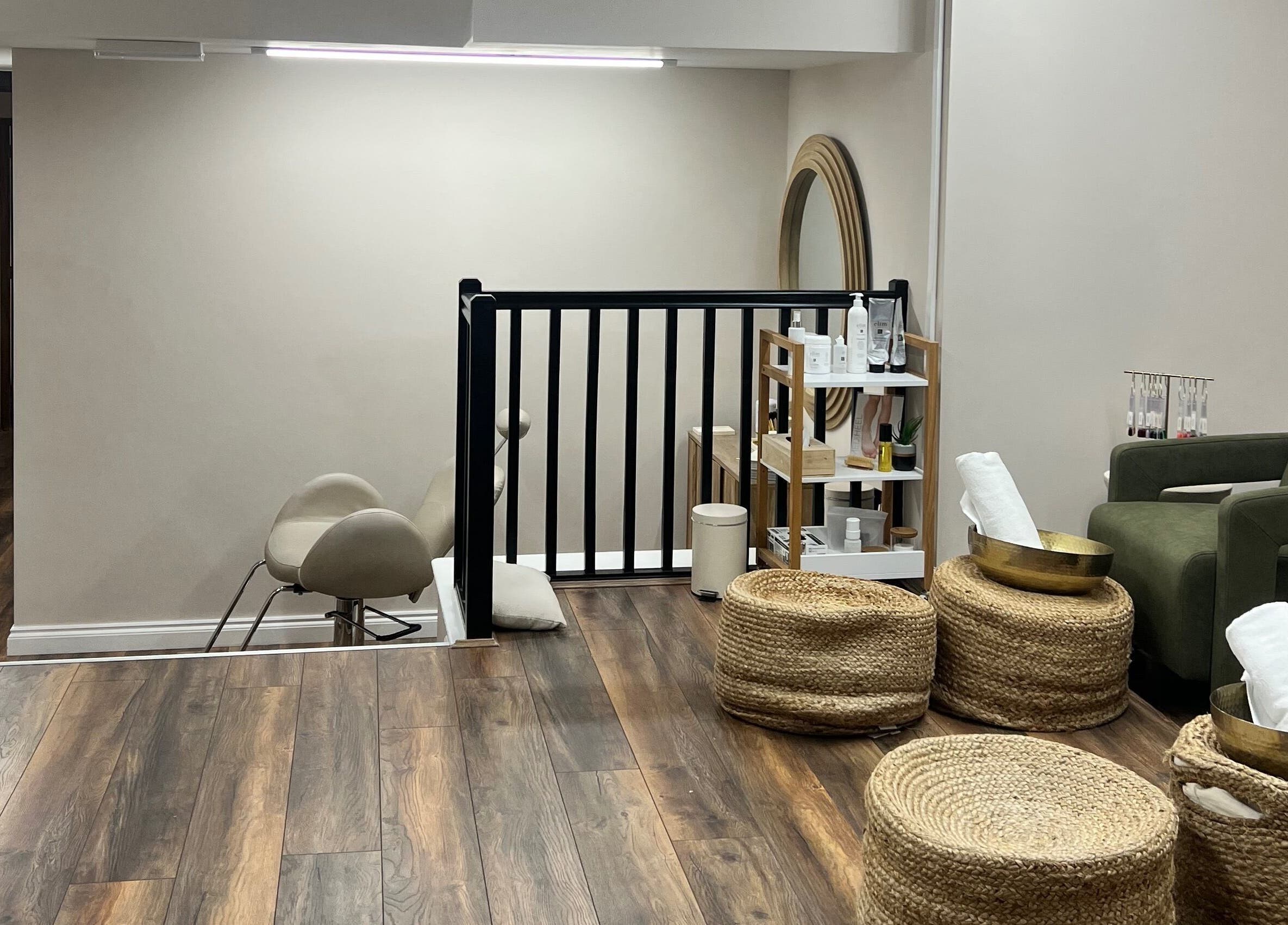 Relaxing interior of Skin & Glo, Macclesfield, England, GB, featuring cozy seating and elegant decor.