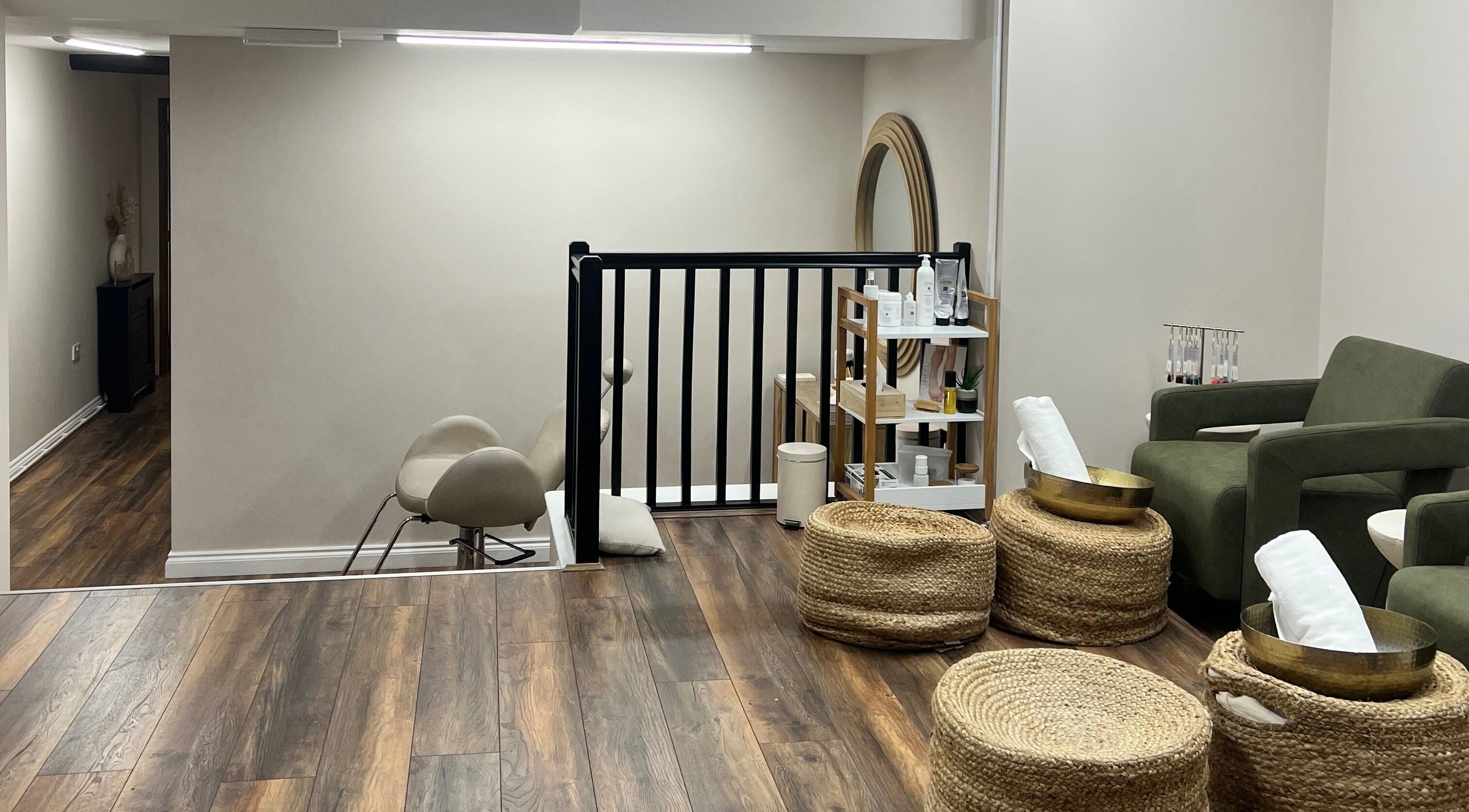 Relaxing interior of Skin & Glo, Macclesfield, England, GB, featuring cozy seating and elegant decor.