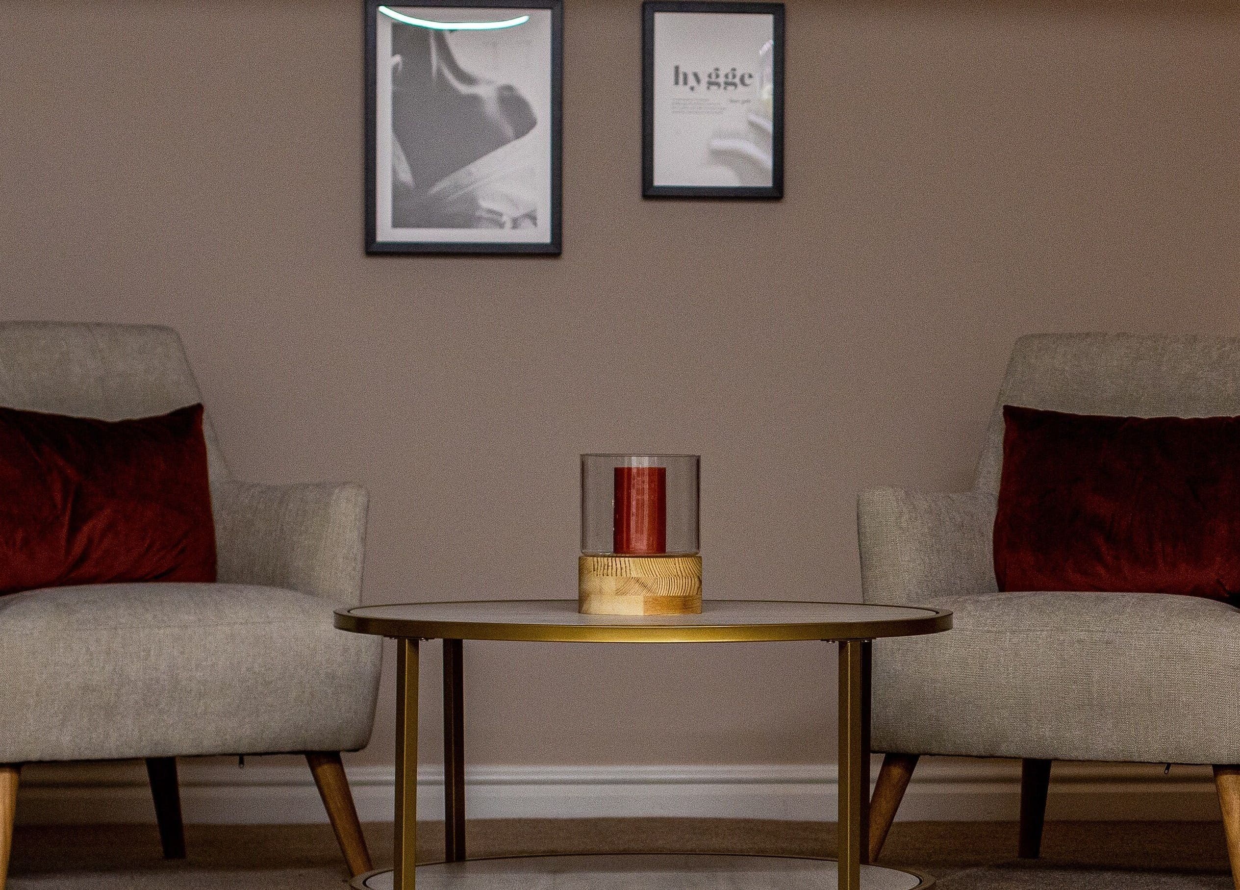 Elegant seating area at Skin & Glo, Macclesfield, England, GB, featuring chic decor and plush seating.