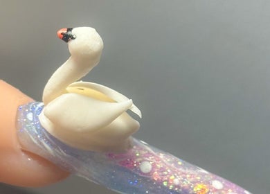 Intricate swan-shaped nail art at Beauty HQ in Southport, England, GB, showcasing unique 3D design.