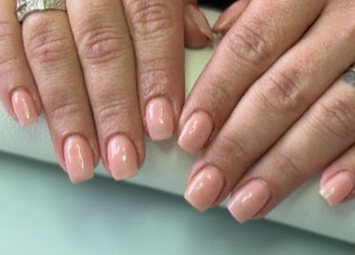 Manicured nails in soft pink at Polished Pearl, Bungay, England. Perfect for a polished look.