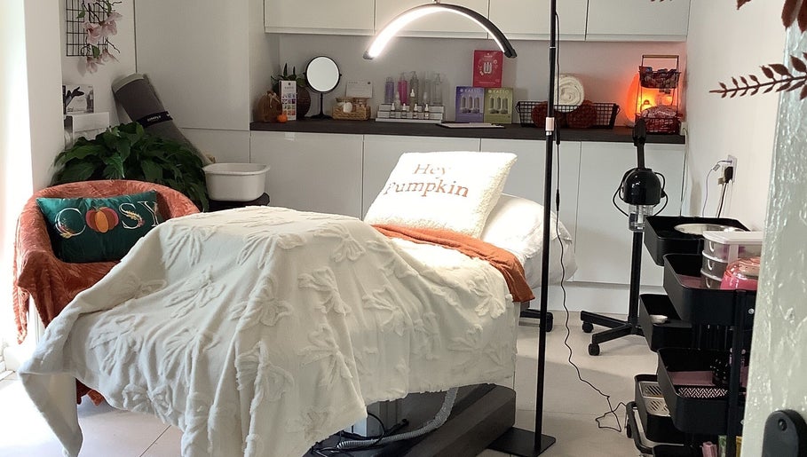 Relaxing treatment room at Beauty and Aesthetics by Sammie-Lou Limited in Timba, Wales, GB, featuring plush decor.