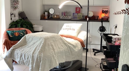 Relaxing treatment room at Beauty and Aesthetics by Sammie-Lou Limited in Timba, Wales, GB, featuring plush decor.