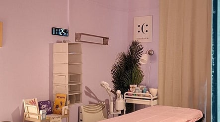 Cozy treatment room at massage.facial.by.sasha.viki in Glasgow, Scotland, GB with a calming ambiance.