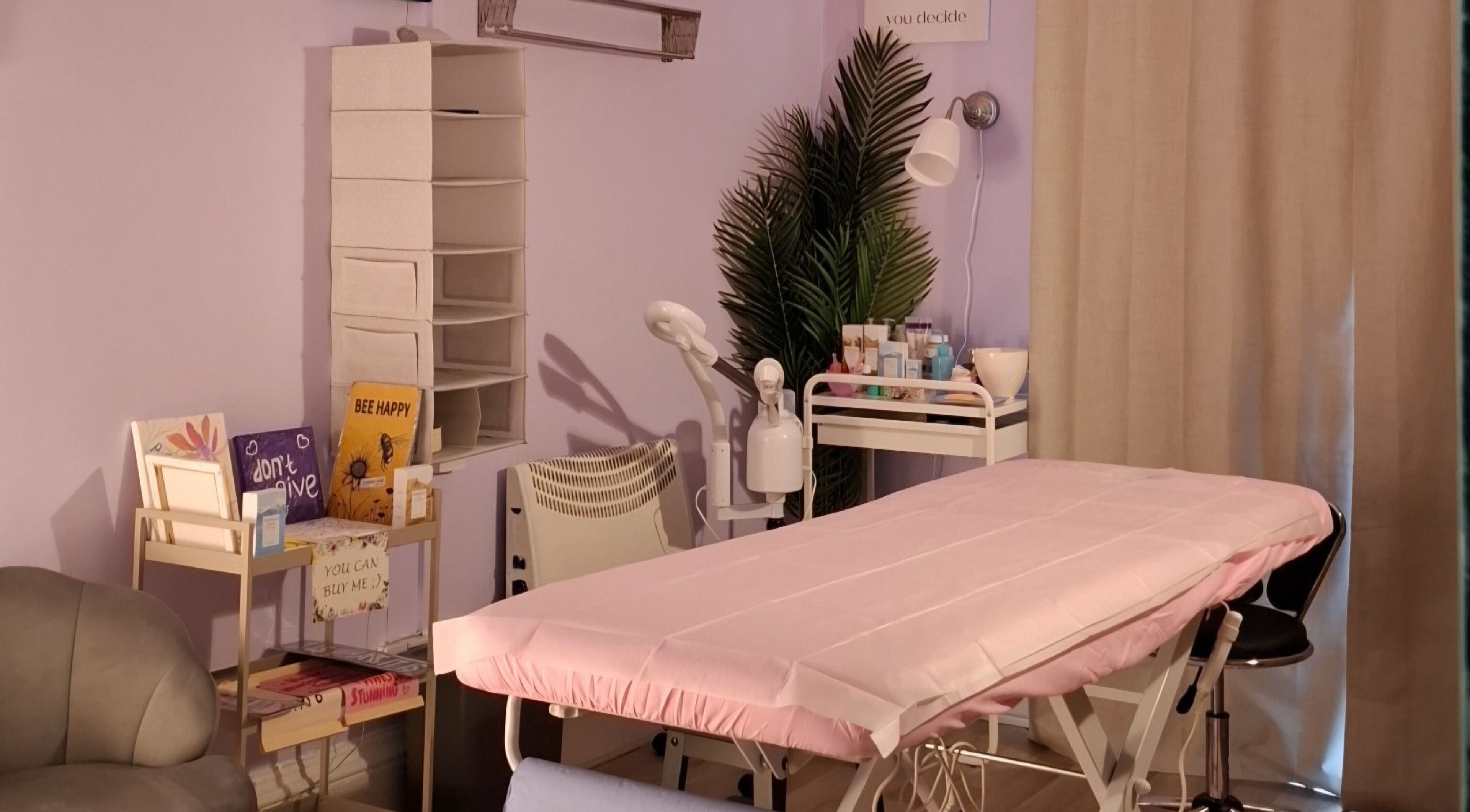 Relaxing spa room at Massage Facial By Sasha Viki in Glasgow, Scotland, GB, with a massage table and cozy decor.