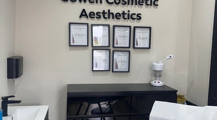 Certification wall at Cowen Cosmetic Aesthetics in Hoghton, England, GB showcases professional achievements.