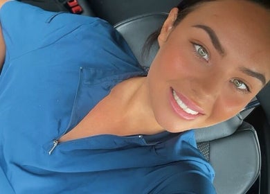 Professional beautician smiling at Cowen Cosmetic Aesthetics, Hoghton, England, GB.