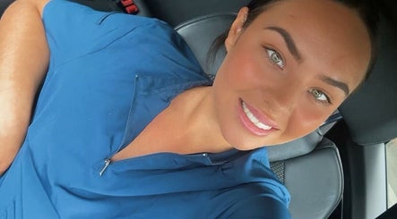 Professional beautician smiling at Cowen Cosmetic Aesthetics, Hoghton, England, GB.