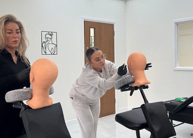 Professional training at EJ Hair Clinic in Keynsham, England, GB, featuring detailed hair technique practice.