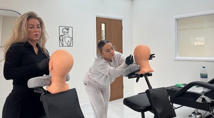 Professional training at EJ Hair Clinic in Keynsham, England, GB, featuring detailed hair technique practice.