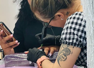 Nail technician creating intricate designs at Vien Beauty Badham, Dickson, Australian Capital Territory, AU.