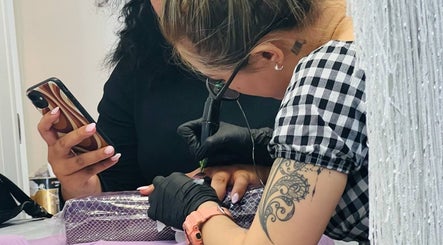 Nail technician creating intricate designs at Vien Beauty Badham, Dickson, Australian Capital Territory, AU.