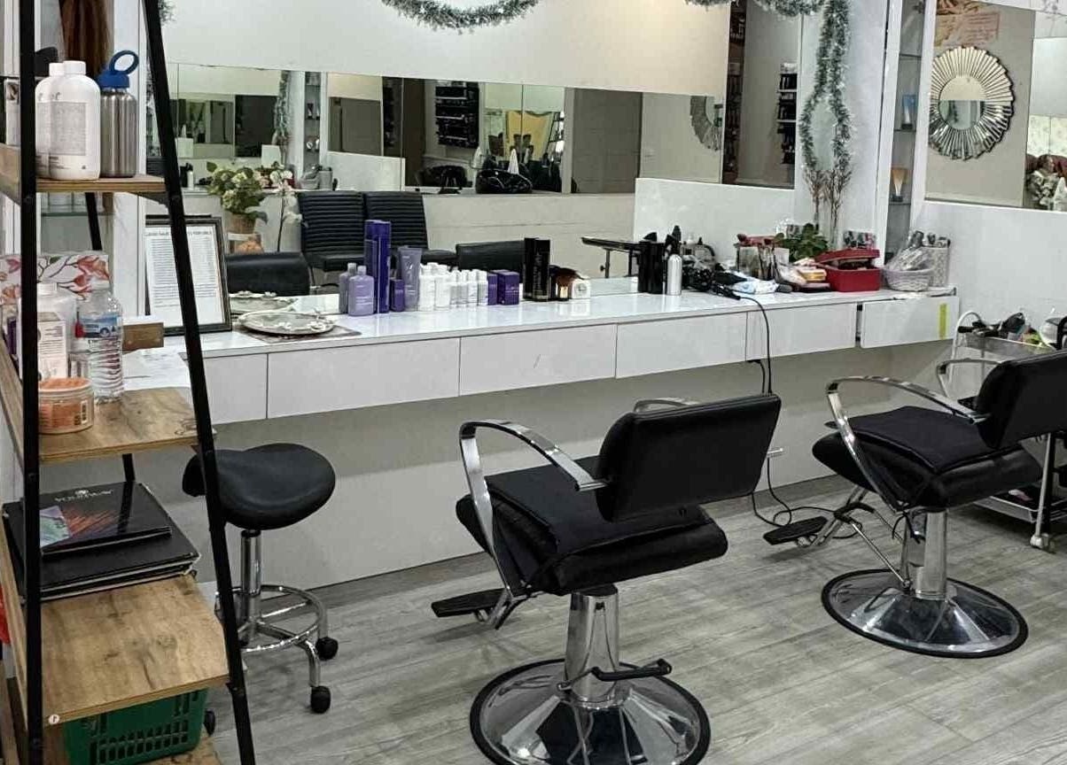 Modern salon interior at VBeauty Dickson, Dickson, Australian Capital Territory, AU, featuring sleek styling chairs.