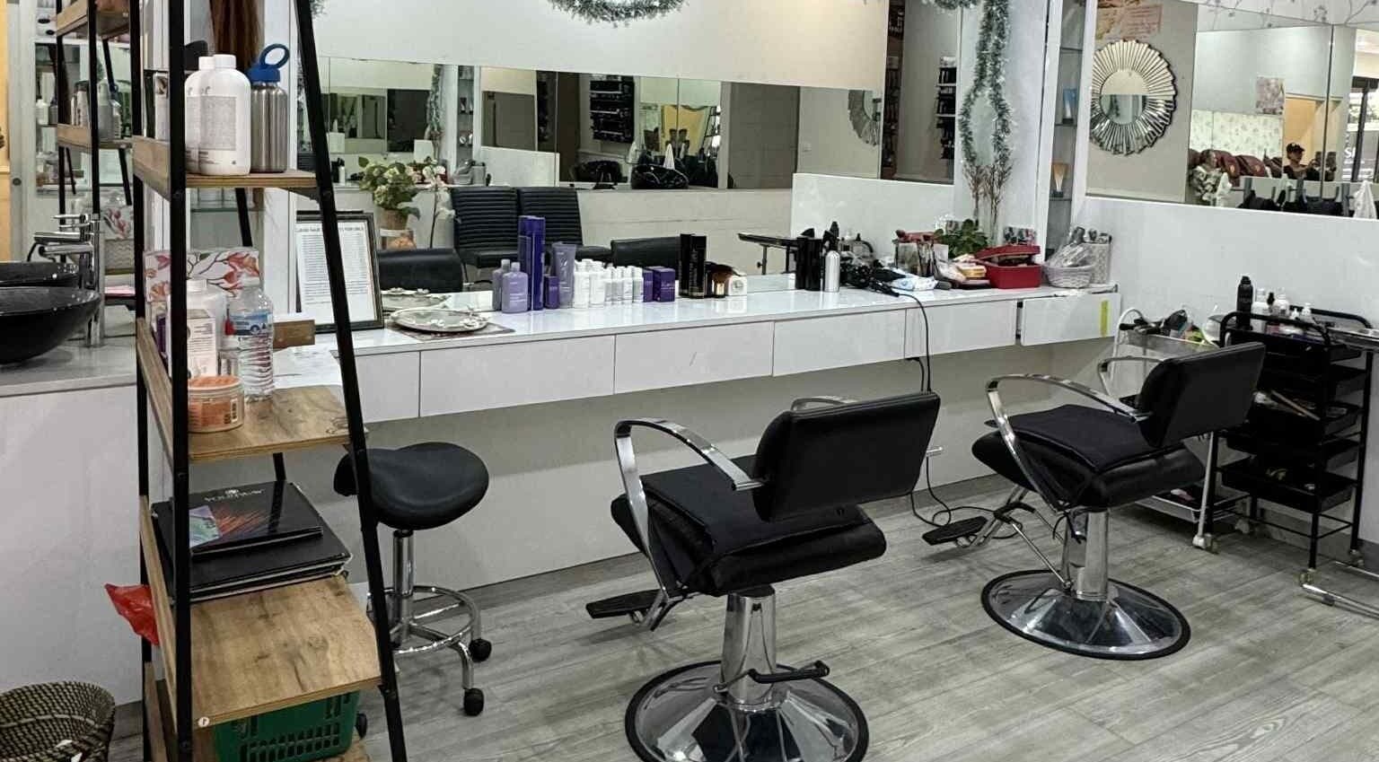 Modern salon interior at VBeauty Dickson, Dickson, Australian Capital Territory, AU, featuring sleek styling chairs.