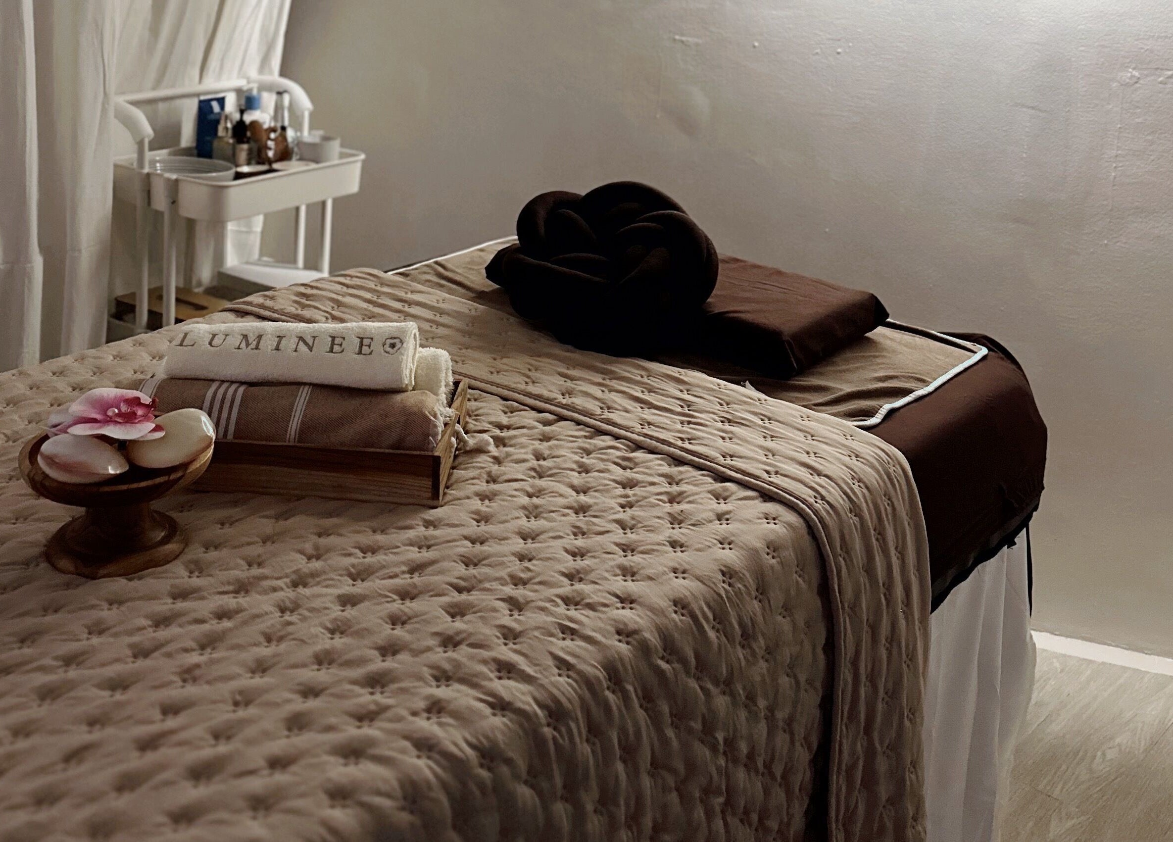Luxurious massage bed at Luminee Spa, Bali, Bali, ID offers a tranquil sanctuary for ultimate relaxation.