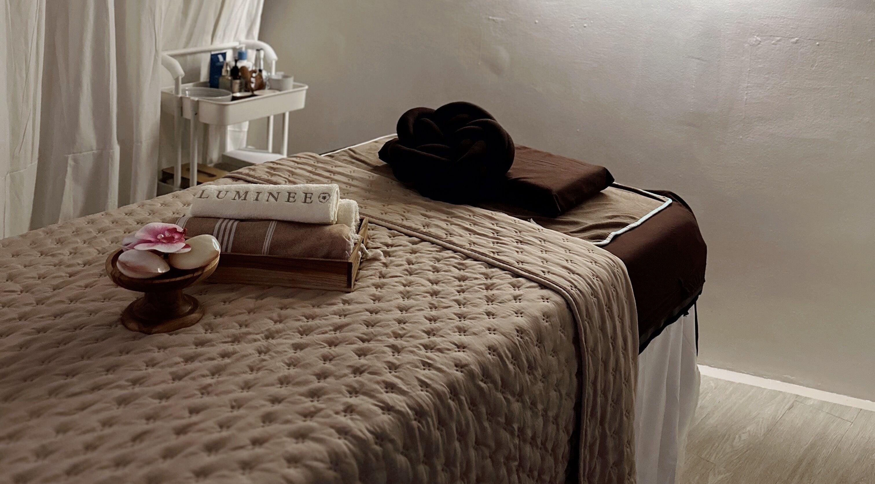 Luxurious massage bed at Luminee Spa, Bali, Bali, ID offers a tranquil sanctuary for ultimate relaxation.