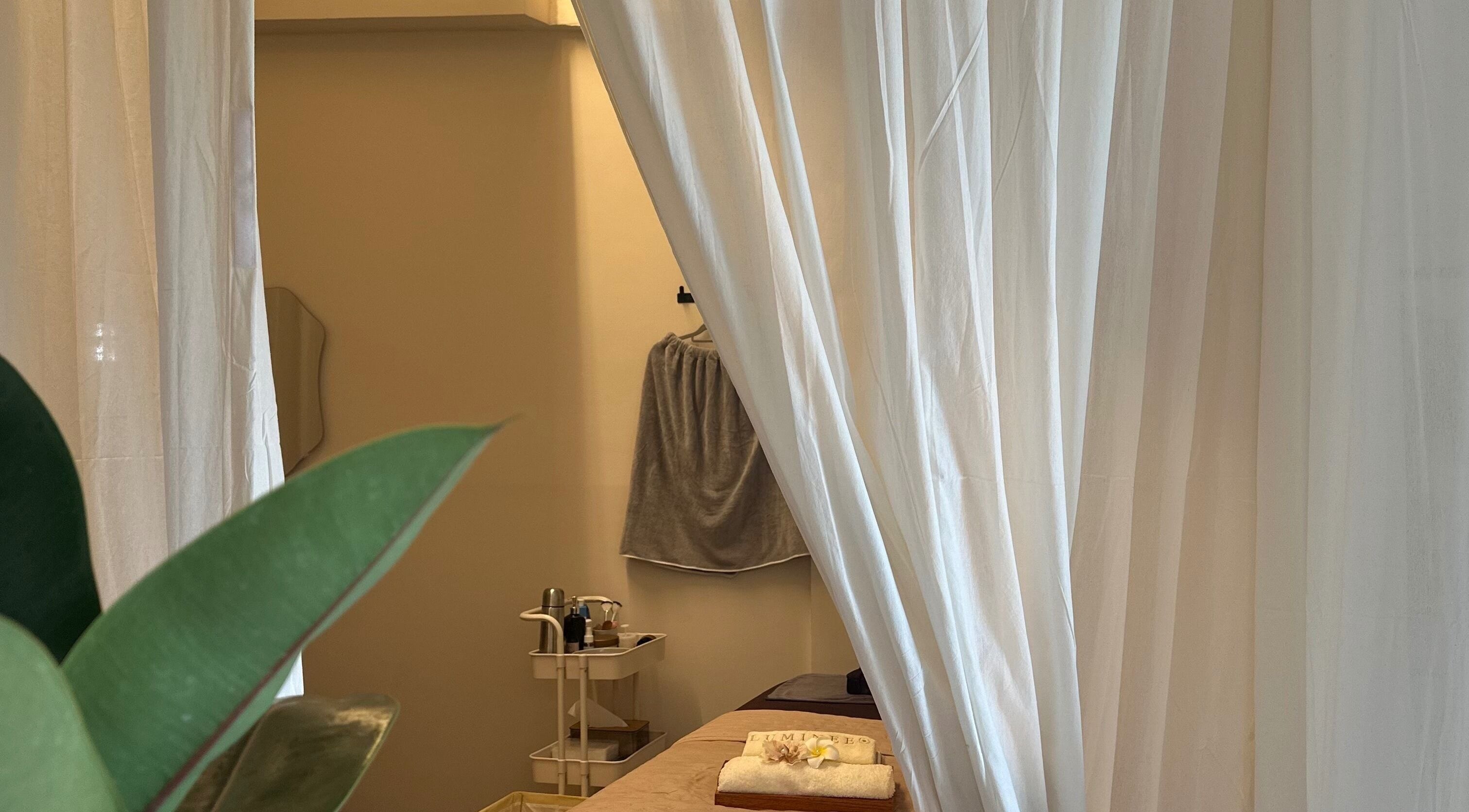 Tranquil massage room with curtains at Luminee Spa, Bali, Bali, ID for optimal relaxation.