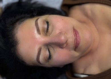 Relaxed woman enjoying a facial treatment at Studio DCV by Diana in La Crescenta-montrose, California, US.