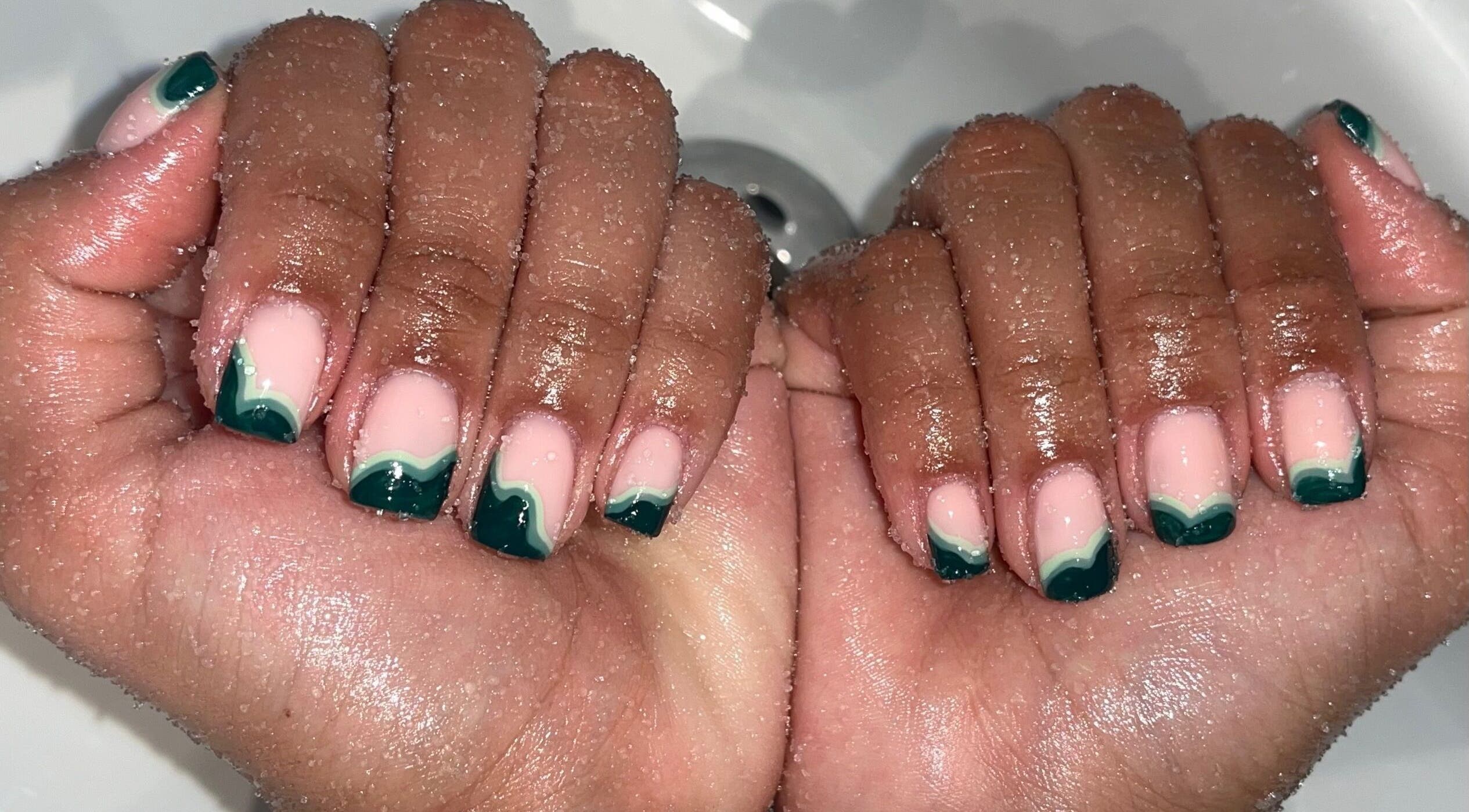 Detailed nail art with green accents at Left & Right Beauty, Colchester, England, GB.