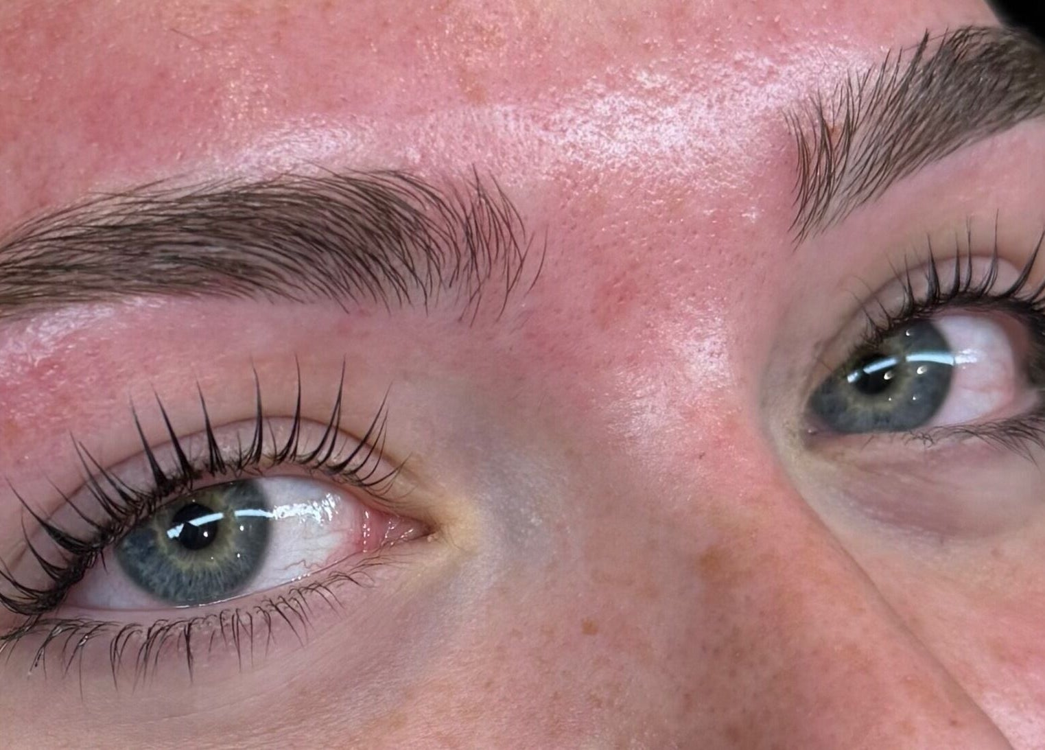 Close-up of perfectly groomed eyebrows and lashes at Left & Right Beauty, Colchester, England, GB.
