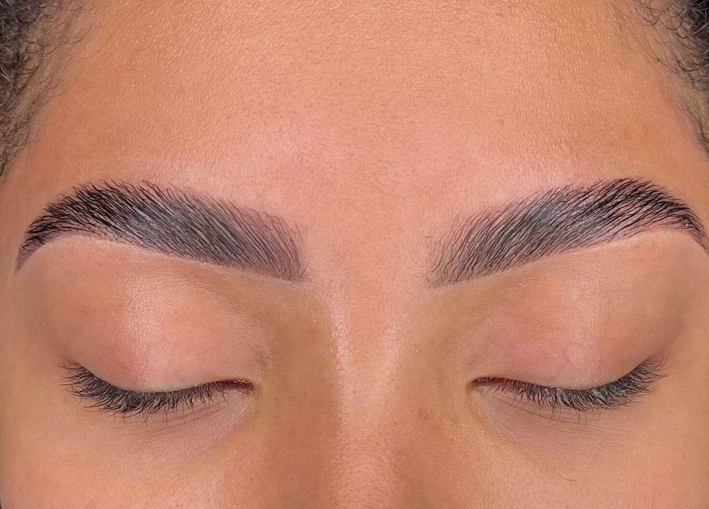 Close-up of expertly shaped eyebrows at Left & Right Beauty, Colchester, England, GB.