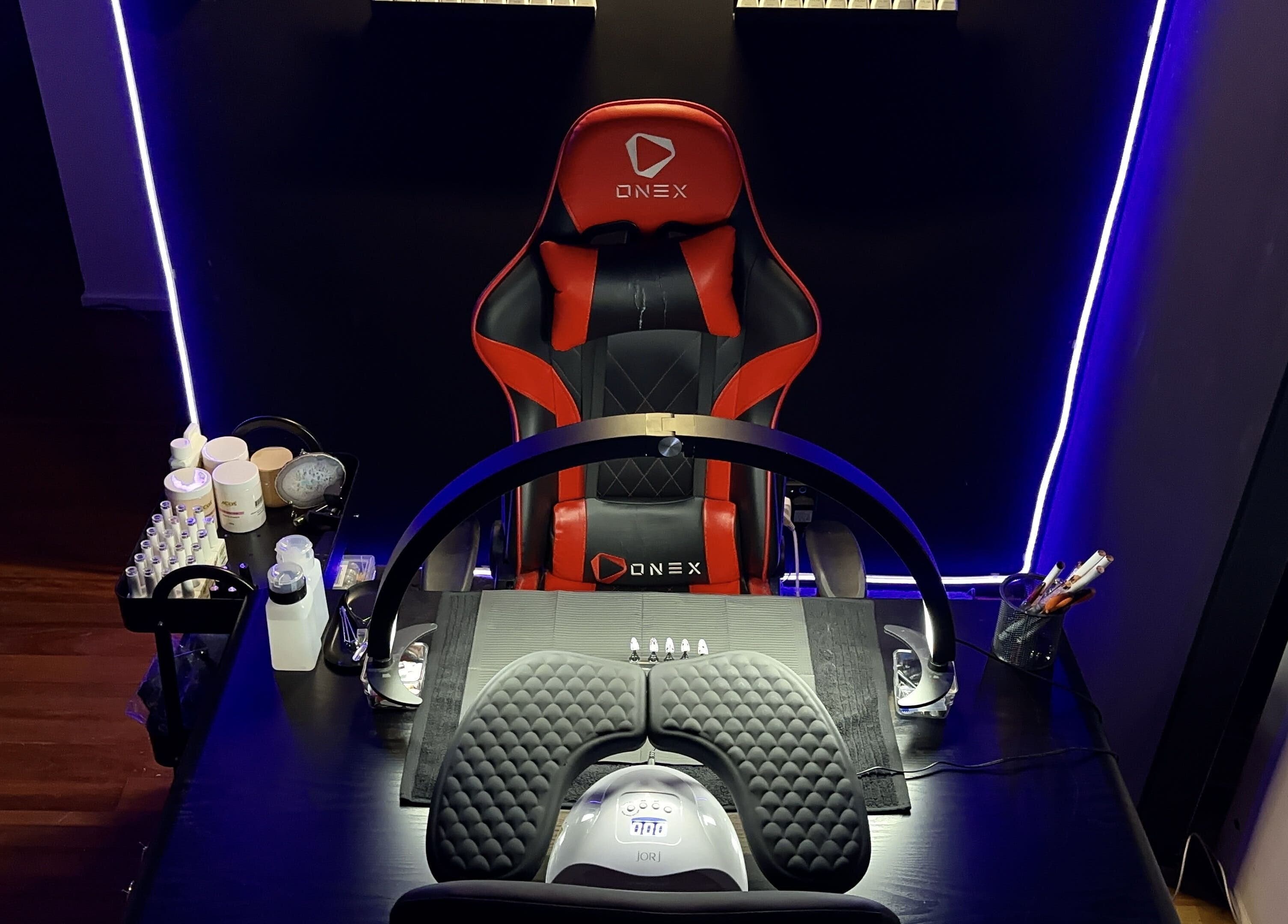 Modern nail station with gaming chair at Dark Star Nail Bar, Goonellabah, New South Wales, AU.