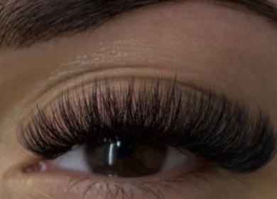 Close-up of elegant eyelash extensions at Lashed Out Cosmetics, Blue Haven, New South Wales, AU.