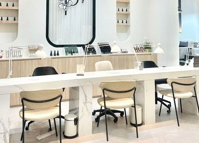 Modern interior at Peony Beauty Center Kalba featuring sleek workstations in Kalba, Sharjah, AE.