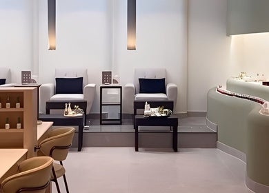 Peony Beauty Center Kalba offers a serene lounge with plush seating and modern decor in Kalba, Sharjah, AE.