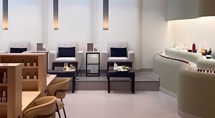 Peony Beauty Center Kalba offers a serene lounge with plush seating and modern decor in Kalba, Sharjah, AE.