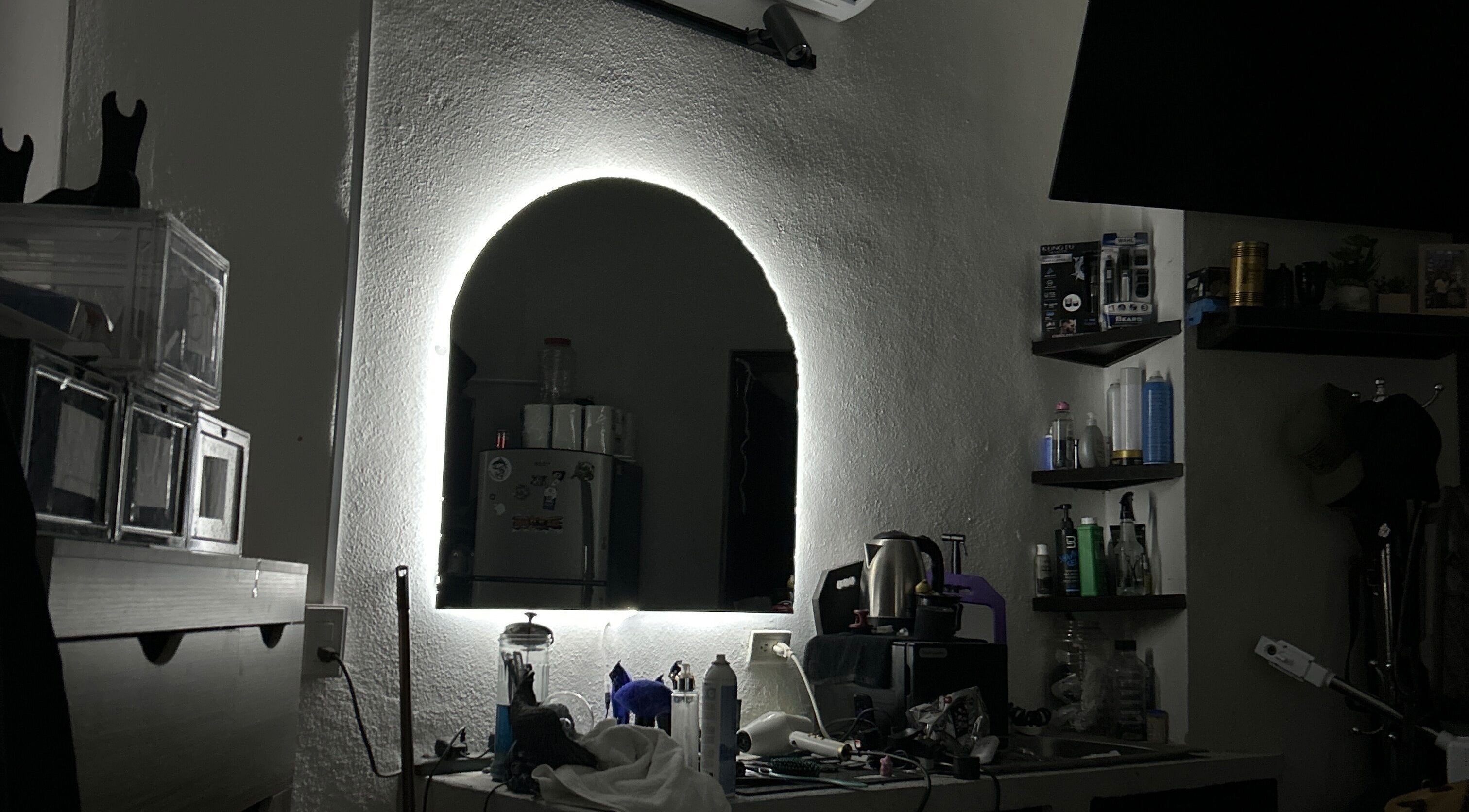 A stylish barber station at L’Hommebarbershopp, Cabo San Lucas, Baja California Sur, MX, with various grooming tools.