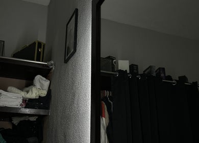 Tidy shelf with folded towels at L’Hommebarbershopp, Cabo San Lucas, Baja California Sur, MX.