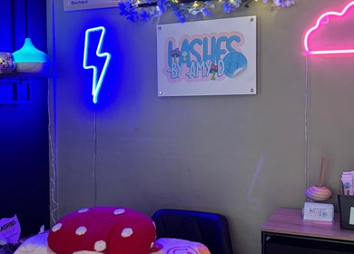 Cozy neon-lit corner at Lashes By Amy.D, Runcorn, England, GB, showcasing vibrant decor and branding.