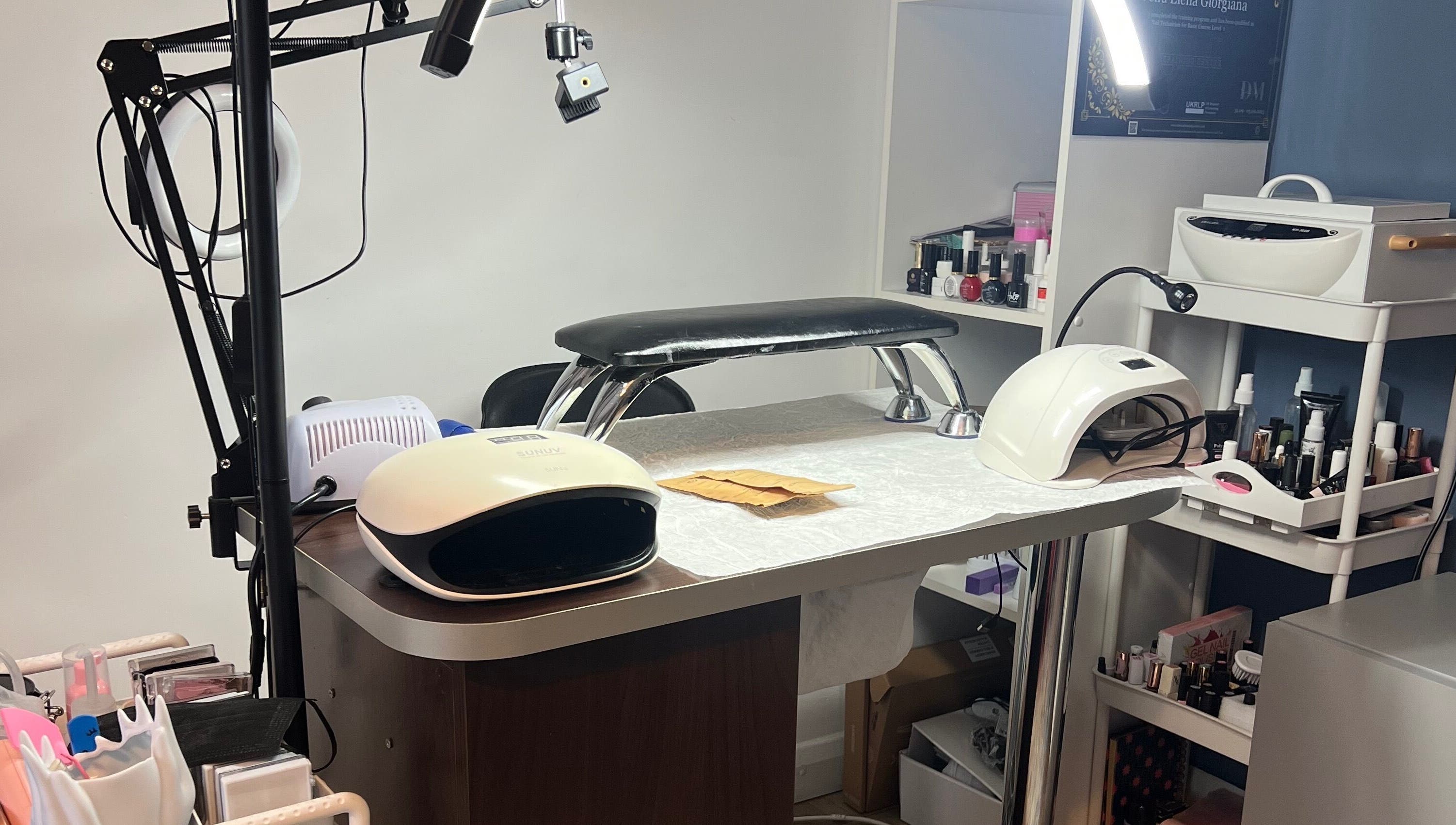 Manicure station at Nova Elle Beauty, Lutterworth, England, GB with nail tools and polishes.