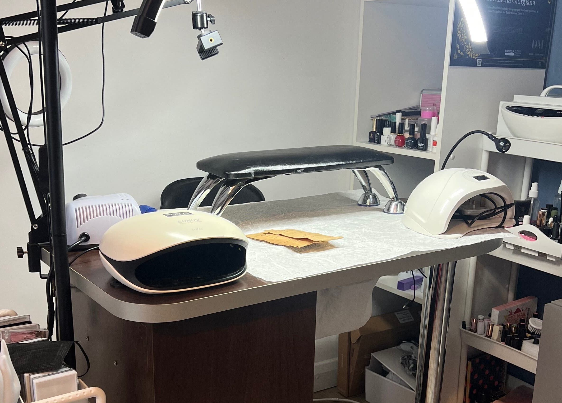 Manicure station at Nova Elle Beauty, Lutterworth, England, GB with nail tools and polishes.