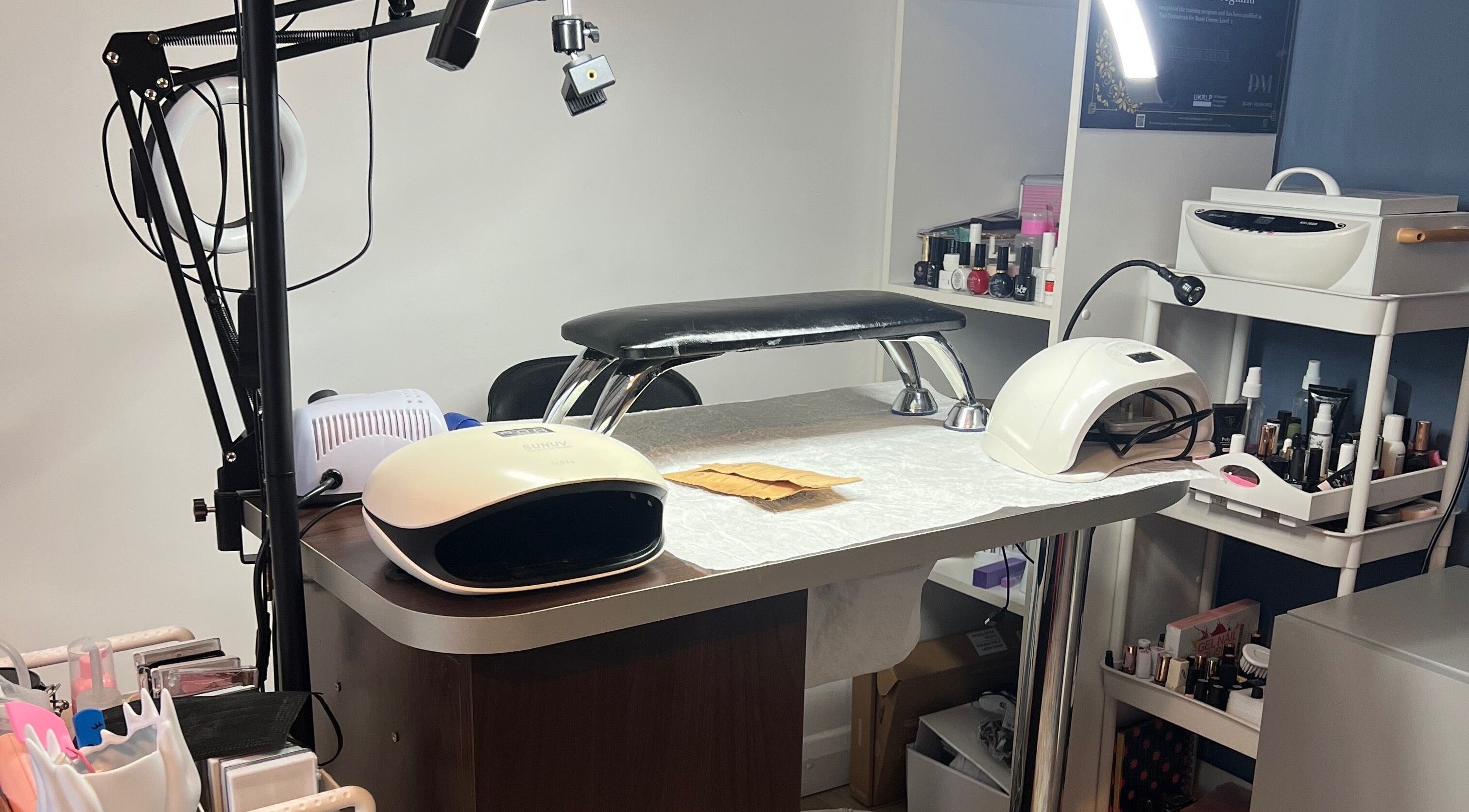 Manicure station at Nova Elle Beauty, Lutterworth, England, GB with nail tools and polishes.