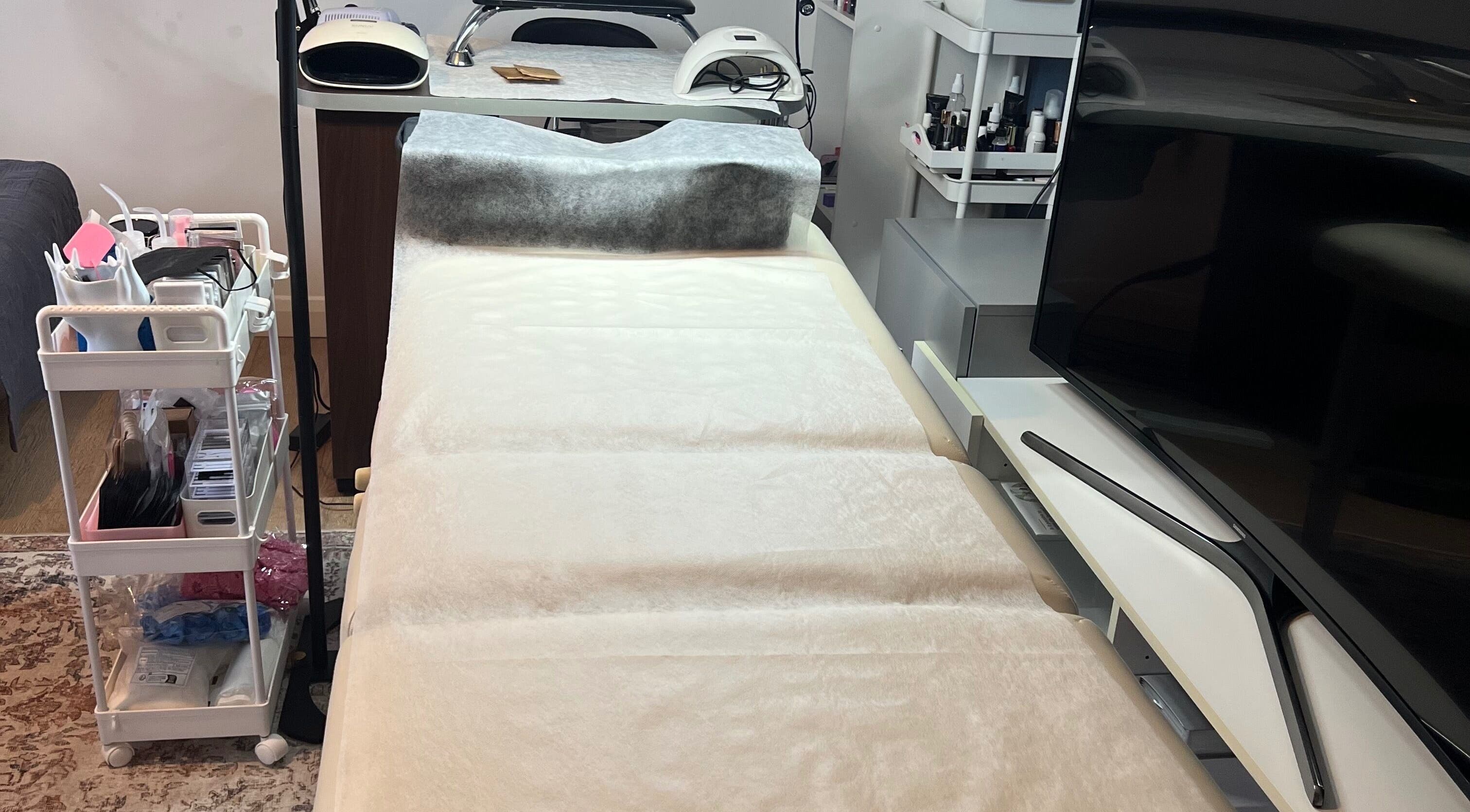 Comfortable treatment area at Nova Elle Beauty in Lutterworth, England, GB, showcasing professional equipment.