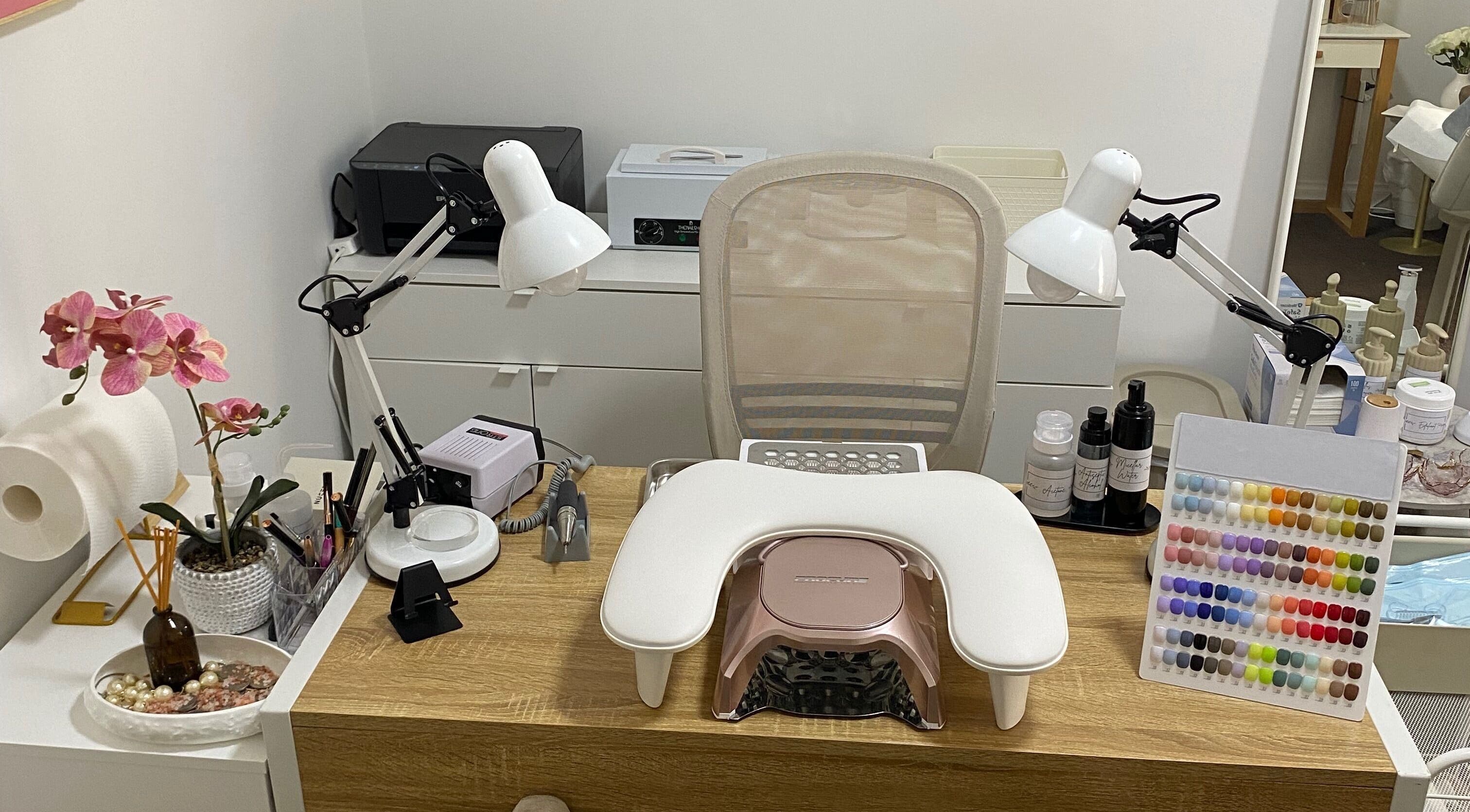 Paula Sontop salon nail station with vibrant polish display in Mile End, South Australia, AU.