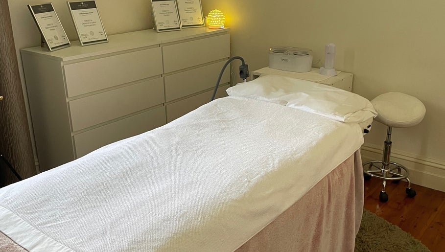 Cozy treatment room at The Beauty House, Prospect, South Australia, AU, with a massage bed and calming atmosphere.