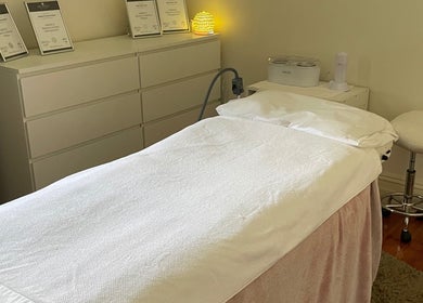 Cozy treatment room at The Beauty House, Prospect, South Australia, AU, with a massage bed and calming atmosphere.