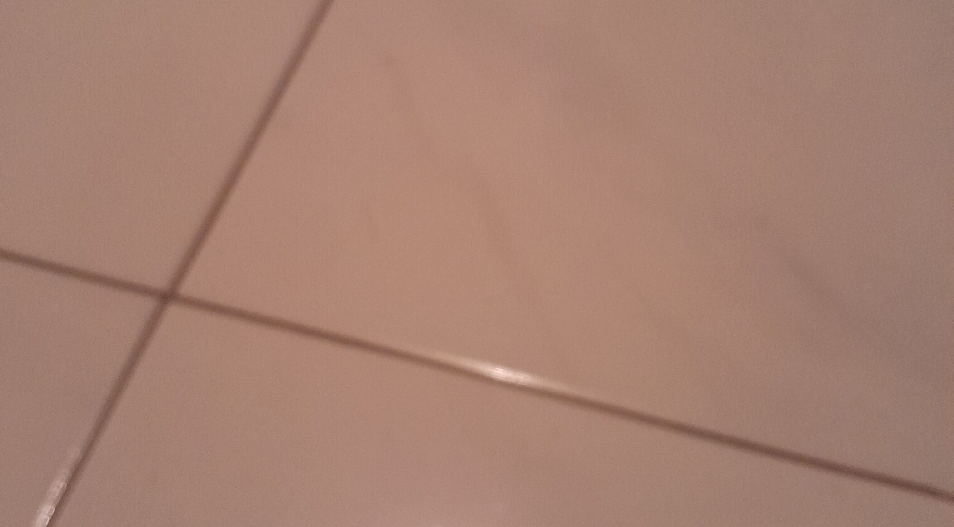 Smooth Touch spa's elegant tiled floor in Bridgetown, Saint Michael, BB enhances the serene ambiance.